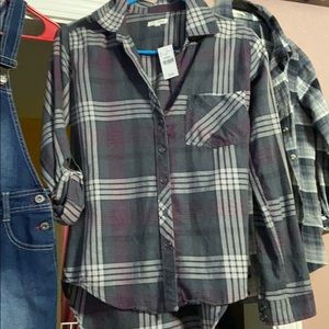 Two plaid button up shirts